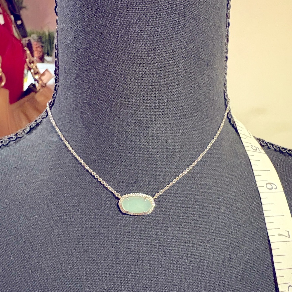 KS silver chain with light stone